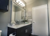 Thumbnail 10 of 37 - a bathroom with a sink and a mirror at Republic at Alamo Heights, San Antonio, 78209
