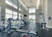 Thumbnail 12 of 37 - a gym with treadmills and other exercise equipment at Republic at Alamo Heights, Texas, 78209