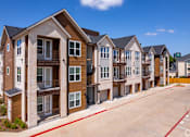 Thumbnail 21 of 22 - Modern apartment buildings with Reserved Resident Parking at Kessler, Fort Worth, TX