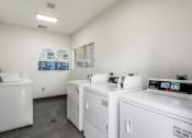 Thumbnail 7 of 13 - our apartments have a laundry room with washer and dryer  at Rosillo Creek Apartments, San Antonio, 78218