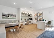 Thumbnail 7 of 72 - a living room with a kitchen and a dining area at Radius on Grove, Texas