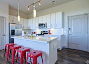Thumbnail 67 of 72 - Kitchen with a kitchen islandat Radius on Grove, Austin