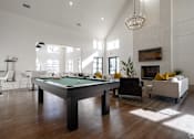 Thumbnail 9 of 25 - an open living room with a pool table at The Fitzroy San Marcos, San Marcos