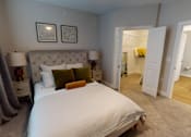 Thumbnail 19 of 25 - a bedroom with a large bed and a closet at The Fitzroy San Marcos, San Marcos, Texas