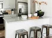 Thumbnail 6 of 41 - Modern Kitchen Island at Villas of Mason Hills, Leander, Texas
