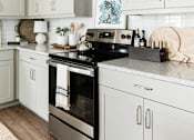 Thumbnail 12 of 41 - Kitchen with appliance at Villas of Mason Hills, Leander, 78641
