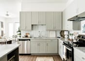 Thumbnail 16 of 41 - Spacious Kitchen at Villas of Mason Hills, Texas 78641