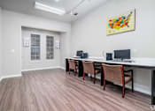 Thumbnail 6 of 35 - Business center with computer workstations at Houston Street Townhomes Apartments, San Antonio, 78220