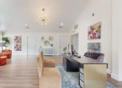 Thumbnail 10 of 24 - a living room with a desk and a large window at The Vale Apartments and Townhomes, Cordova, 38018