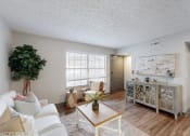 Thumbnail 1 of 46 - a living room with a couch and a table at Island Club Apartments, Columbus, OH, 43235