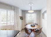 Thumbnail 5 of 35 - an image of a dining room with a table and chairs at Runaway Bay Apartments, Columbus, OH, 43204