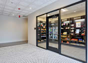 Thumbnail 18 of 26 - A store with a black and white checkered floor.