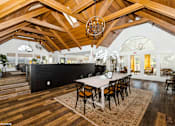 Thumbnail 36 of 46 - A dining room with a wooden table and chairs at Island Club Apartments, Ohio, 43235