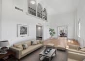 Thumbnail 22 of 25 - Penthouse living room has hardwood floors with tall ceilings at 275 on the Park Apartments, St. Louis, 63108