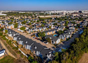 Thumbnail 47 of 55 - an aerial view of a neighborhood of houses in a city at Water Ridge Apartments, Texas, 75061