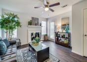Thumbnail 9 of 42 - Luxurious Living Room Remodel With Standard Fireplace at Wildwood Apartments, CLEAR Property Management, Austin, TX, 78752