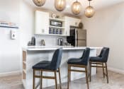 Thumbnail 32 of 42 - Gourmet Kitchen With Island at Wildwood Apartments, CLEAR Property Management, Austin, 78752