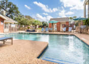 Thumbnail 24 of 42 - Refreshing Pool With Large Sundeck And Wi-Fi at Wildwood Apartments, CLEAR Property Management, Austin, Texas