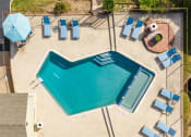 Thumbnail 36 of 42 - Drone View Of Pool at Wildwood Apartments, CLEAR Property Management, Austin, TX