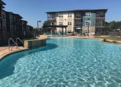 Thumbnail 21 of 27 - Invigorating swimming pool with sunning deck at CLEAR Property Management , The Lookout at Comanche Hill, San Antonio, TX, 78247