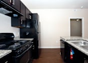 Thumbnail 3 of 40 - Kitchen at Millennium on Post, Texas, 78666