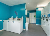 Thumbnail 27 of 42 - Laundry Room at Wildwood Apartments, CLEAR Property Management, Austin, TX, 78752