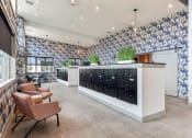 Thumbnail 2 of 35 - a lobby with chairs and a counter filled with bottles of wine  at The Virginia, Texas, 78155