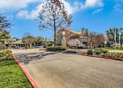 Thumbnail 30 of 37 - Apartments Entrance at Newport Apartments, Irving, Texas