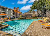 Thumbnail 16 of 37 - Swimming Pool With Relaxing Sundecks at Newport Apartments, Irving, Texas