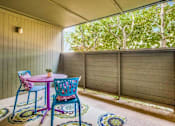 Thumbnail 14 of 37 - Outdoor Patio Area at Newport Apartments, Irving, TX