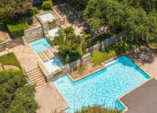 Thumbnail 20 of 35 - an aerial view of a resort style pool and spa  at Sunset Canyon, San Antonio, TX, 78232