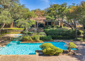 Thumbnail 21 of 35 - a house with a swimming pool in front of it  at Sunset Canyon, San Antonio, 78232