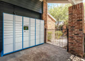 Thumbnail 19 of 35 - the front of a house with a white garage door and a black gate  at Sunset Canyon, San Antonio, 78232