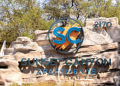 Thumbnail 1 of 35 - a sign for the sunseeker canyon apartments  at Sunset Canyon, Texas