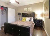 Thumbnail 9 of 55 - a bedroom with a large bed and a closet at Water Ridge Apartments, Texas