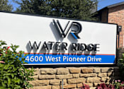 Thumbnail 1 of 42 - A sign for Water Ridge at 4600 West Pioneer Drive at Water Ridge Apartments , Texas, 75061