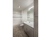 Thumbnail 2 of 15 - Bathroom with Vanity Lights at Apex Apartments, Arlington, 22206