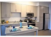 Thumbnail 1 of 15 - Fully Equipped Kitchen With Modern Appliances at Apex Apartments, Arlington, Virginia