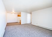 Thumbnail 19 of 44 - A room with a carpeted floor and a ceiling fan. Fargo, ND Country Edge Apartments