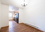 Thumbnail 14 of 23 - A black refrigerator in a kitchen with white walls. Fargo, ND Somerset Apartments