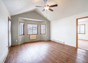 Thumbnail 9 of 23 - A room with a ceiling fan and wooden floors. Fargo, ND Somerset Apartments
