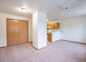 Thumbnail 20 of 23 - A room with a ceiling fan and a door. Fargo, ND Summit Point