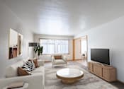 Thumbnail 1 of 12 - A modern living room with a white couch,  coffee table, and a television. Fargo, ND L&R Apartments