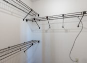 Thumbnail 13 of 14 - Empty shelves in a white room.West Fargo, ND Clearview Apartments