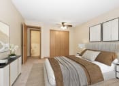 Thumbnail 3 of 29 - a bedroom with a large bed and a ceiling fan. Anoka, MN Dellwood Estates
