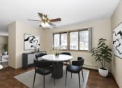 Thumbnail 2 of 29 - a dining room with a table and chairs and a ceiling fan. Anoka, MN Dellwood Estates