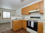 Thumbnail 5 of 7 - Ashbury Apartments | Efficiency | Kitchen | Living Space