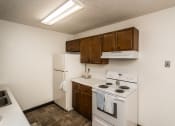 Thumbnail 8 of 16 - this is a photo of the kitchen of a 560 square foot, 1 bedroom apartment at as