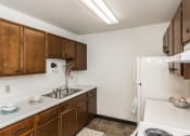 Thumbnail 9 of 16 - this is a photo of the kitchen of a 560 square foot, 1 bedroom apartment at as