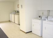Thumbnail 9 of 11 - Amberwood Court Apartments | Laundry Room